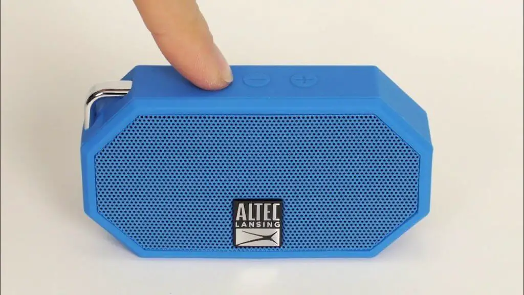 Press and hold power button on Altec Lansing bluetooth speaker